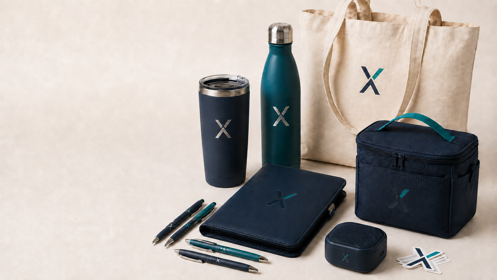 A coordinated collection of branded drinkware, pens, tote, padfolio, cooler, speaker and stickers